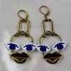 Pair of Stylish Hollow Out Mischievous Face Pendant Earrings For Women - d'or 
