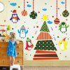 Autocollant amovible Noël de pingouins aux murs de la chambre de l'enfant - coloré 