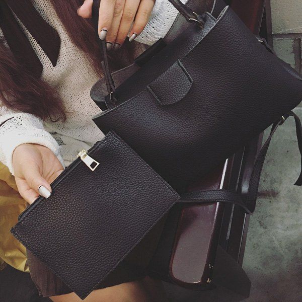 black faux leather clutch bag