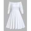 Ensemble mini-robe trapèze à volants et épaules dénudées, haut long à bretelles réglables et œillets à fermeture éclair et colorblock - Noir L