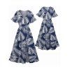 Vacation Couple Outfit Allover Palm Leaf Pattern Flare Sleeve Slit Dress and Roll Up Sleeve Shirt Matching Outfit - Bleu profond S | US 4