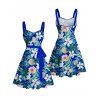 Vacation Couple Outfit Allover Tropical Leaf Flower Pattern Ruched Bust Belt Dress and Roll Up Sleeve Shirt Drawstrings Shorts Matching Outfit - Bleu S | US 4