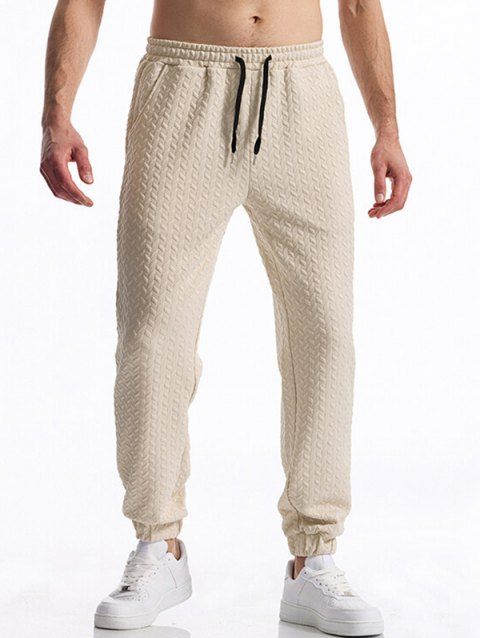 Pantalon décontracté à taille élastique et cordon de serrage pour homme, couleur unie, texturé, noué à la cheville