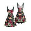 Robe de vacances à motif floral tropical et feuilles, ceinture froncée sur le buste, col en cœur, mini robe hawaïenne trapèze - Noir S | US 4