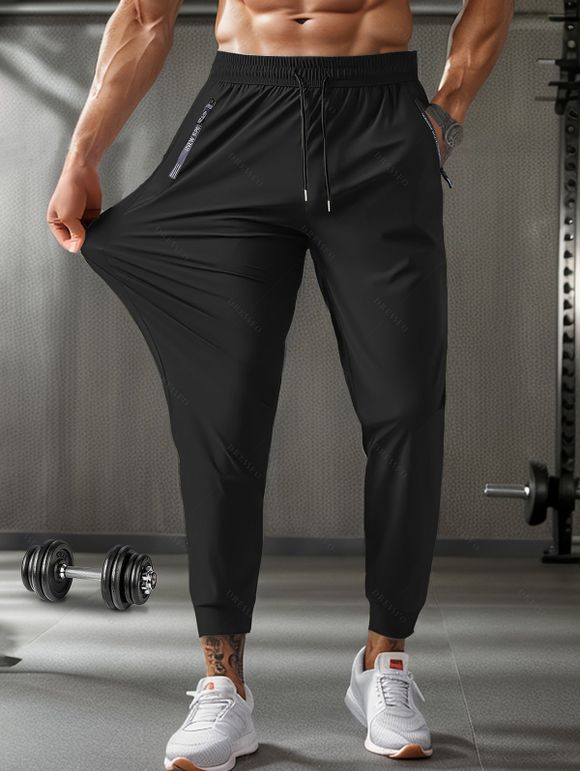 Pantalon long et décontracté pour homme, couleur unie, avec poches et cordon de serrage, taille élastique et respirant - Noir L