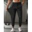 Pantalon long et décontracté pour homme, couleur unie, avec poches et cordon de serrage, taille élastique et respirant - Noir L