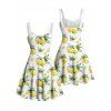 Vacation Couple Outfit Allover Lemon Leaf Pattern Ruched Bust Belt Sweetheart Neck Dress and Button Up Shirt Casual Matching Outfit - Blanc S | US 4