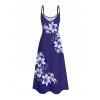 Tenue de vacances pour couple : robe longue débardeur trapèze à bretelles spaghetti, poches et imprimé floral lys, et chemise boutonnée assortie. - Bleu profond S | US 4