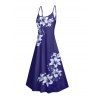 Tenue de vacances pour couple : robe longue débardeur trapèze à bretelles spaghetti, poches et imprimé floral lys, et chemise boutonnée assortie. - Bleu profond S | US 4