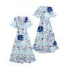 Robe de vacances fendue à imprimé floral et feuilles, col en V, manches mi-évasées, coupe trapèze, mi-longue, décontractée - Bleu clair S | US 4