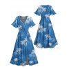 Robe de vacances à imprimé feuilles tropicales et cocotiers, manches évasées et fente - Bleu Ciel M | US 6
