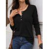 Haut décontracté de couleur unie, haut à manches longues avec boutons texturés - Noir M | US 6