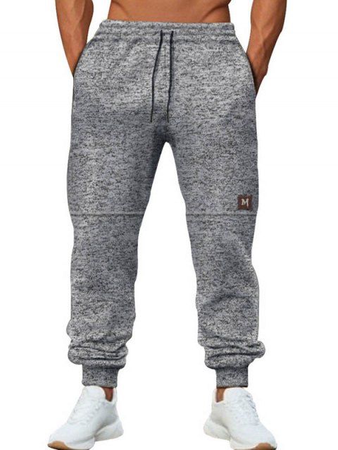 Pantalon chiné pour homme avec cordon de serrage et poches à nouer à la cheville