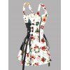 Robe de Noël à imprimé couronne de Père Noël et à lacets avec bretelles et boucle - Blanc S | US 4