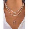 Ensemble de 3 colliers superposés avec pendentif nœud papillon et collier de perles fantaisie - Blanc 