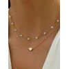 Ensemble de 2 colliers superposés avec pendentif cœur en fausse perle et collier rétro - d'or 
