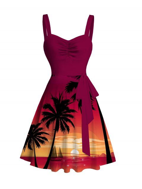 Robe de vacances imprimée coucher de soleil sur un cocotier avec ceinture froncée
