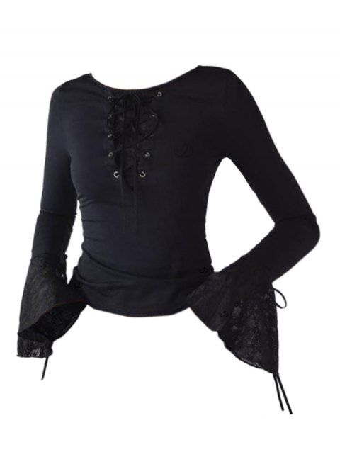 Haut uni à lacets et manches cloche