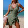 Maillot de bain une pièce de plage à motif géométrique tourbillonnant, ajouré, nœud papillon et fente - Vert profond S | US 4