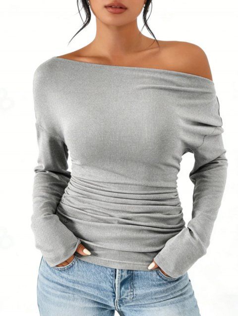 Haut uni à col asymétrique et manches longues froncées