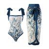 Ensemble maillot de bain une pièce vintage à imprimé feuilles aquarelle et nœud papillon, avec jupe de plage assortie. - Paon Bleu XL | US 10