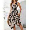 Robe de vacances élégante à col V asymétrique et coupe midi asymétrique - Noir M | US 6