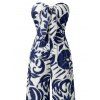 Combinaison de vacances à imprimé botanique et silhouette de feuilles, nœud papillon, épaules dénudées, jambes larges - Bleu profond XXL | US 14