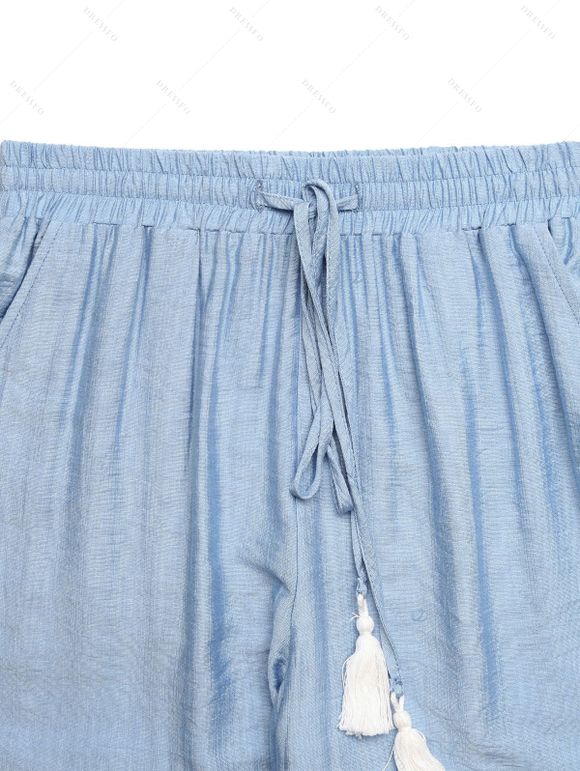 Ensemble deux pièces pour vacances à la plage : haut court à bretelles nouées et pompons, couleur unie, et pantalon large. - Bleu clair M | US 6