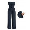 Combinaison de vacances unie texturée, à volants smockés, poche nouée, épaules dénudées et jambes larges. - Bleu de Minuit XL | US 10