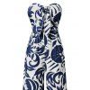 Combinaison de vacances à imprimé botanique et silhouette de feuilles, nœud papillon, épaules dénudées, jambes larges - Bleu profond XL | US 12